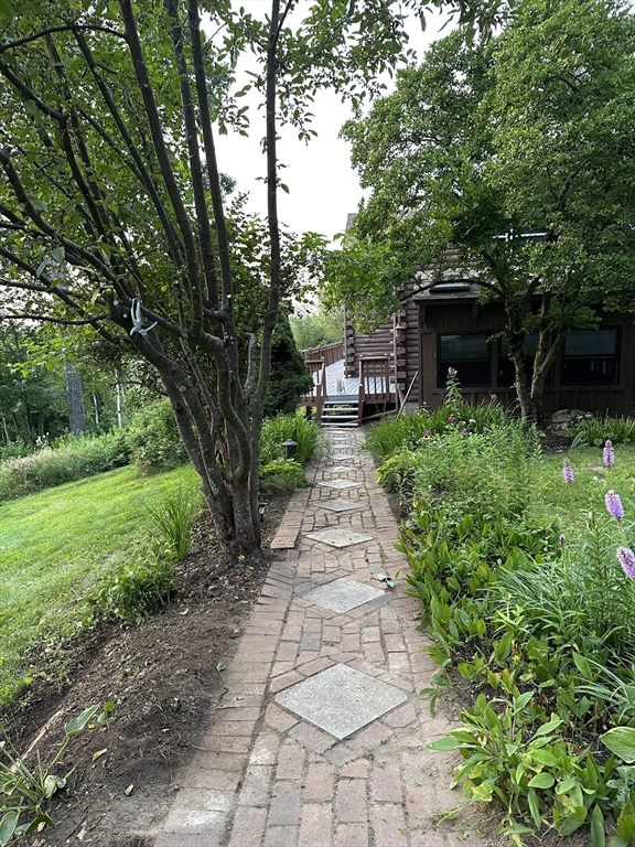 115 Gray Road Templeton, MA 01468 - Photo 28 of 40 a front view of a house with garden