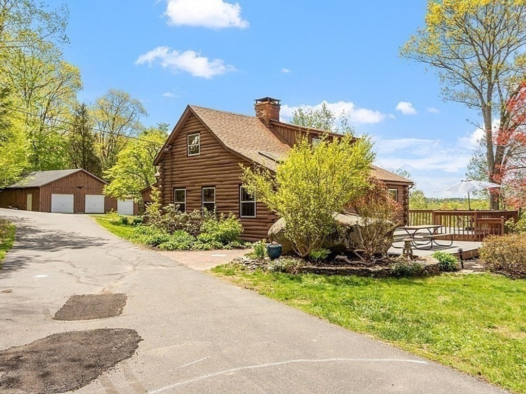 115 Gray Road Templeton, MA 01468 - Photo 5 of 40 a front view of a house with a yard