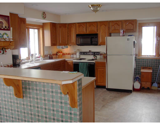 102 Redlands Street Springfield, MA 01104 - Photo 2 of 6 a kitchen with a sink appliances and cabinets