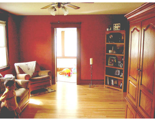 102 Redlands Street Springfield, MA 01104 - Photo 3 of 6 a living room with furniture and a flat screen tv