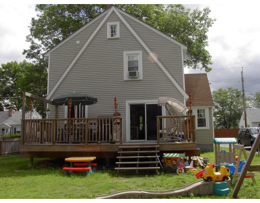 102 Redlands Street Springfield, MA 01104 - Photo 5 of 6 a view of a house with backyard and sitting area