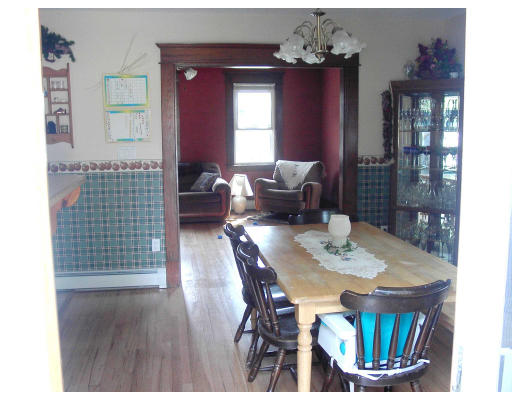 102 Redlands Street Springfield, MA 01104 - Photo 6 of 6 a view of a dining room with furniture and chandelier