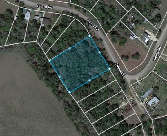 0 Sierra Road Brenham, TX 77833 - Photo 2 of 7 view of a backyard