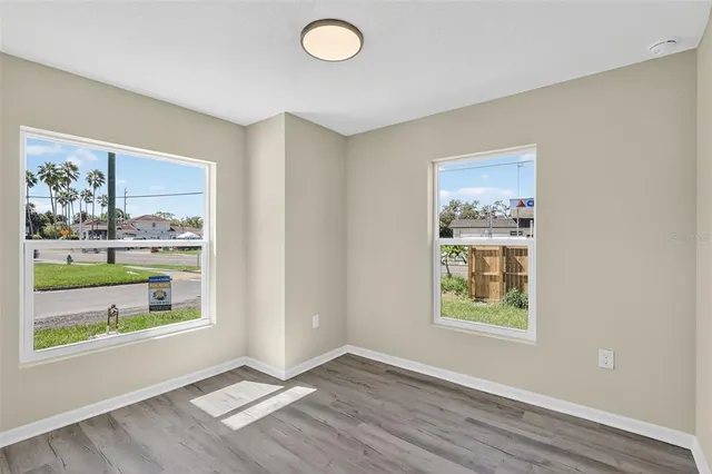 an empty room with windows