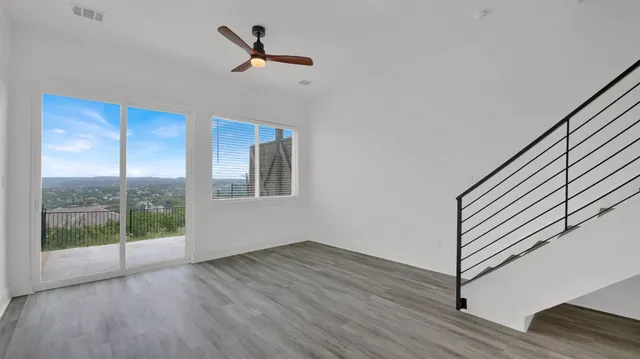 a view of entryway with wooden floor