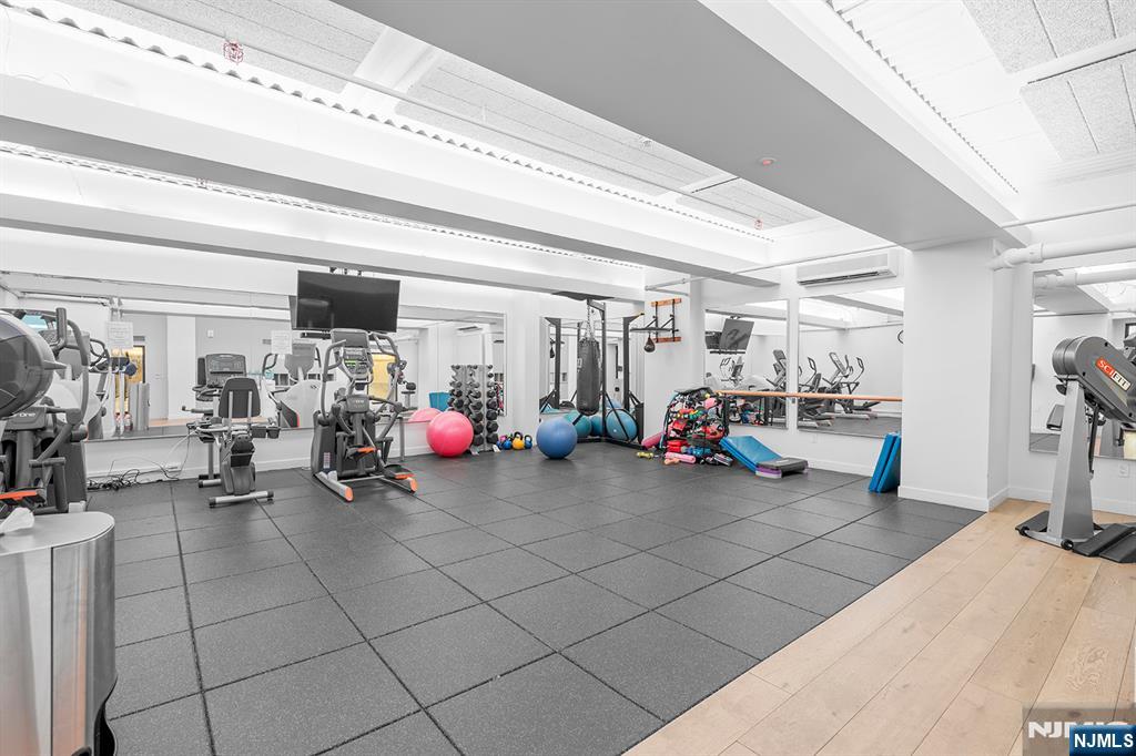 250 Gorge Road, Unit 8J Cliffside Park, NJ 07010 - Photo 33 of 36 a view of a room with gym equipment