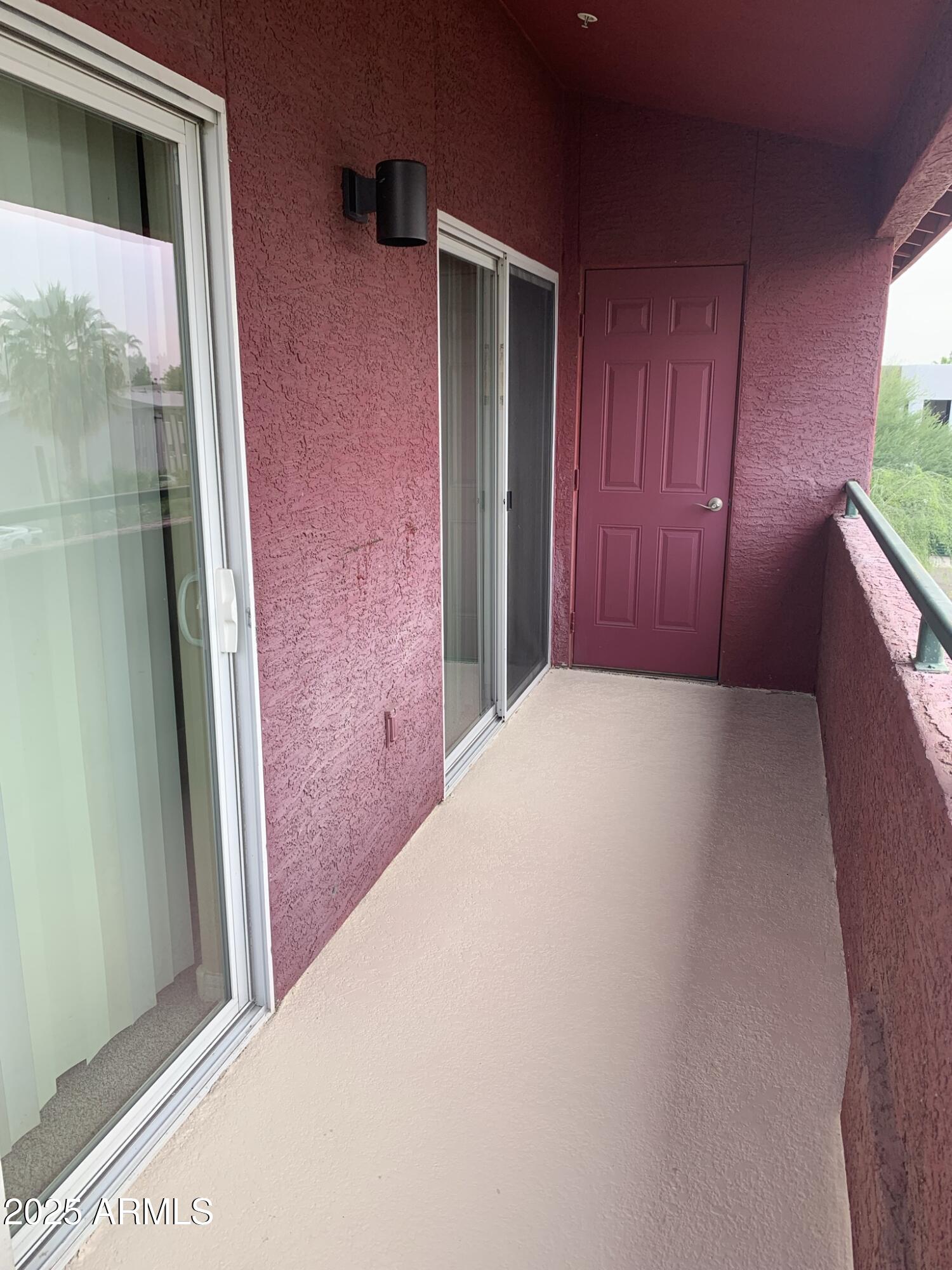 1117 East 8th Street, Unit 3001 Tempe, AZ 85281 - Photo 13 of 16 a view of a hallway with a large window