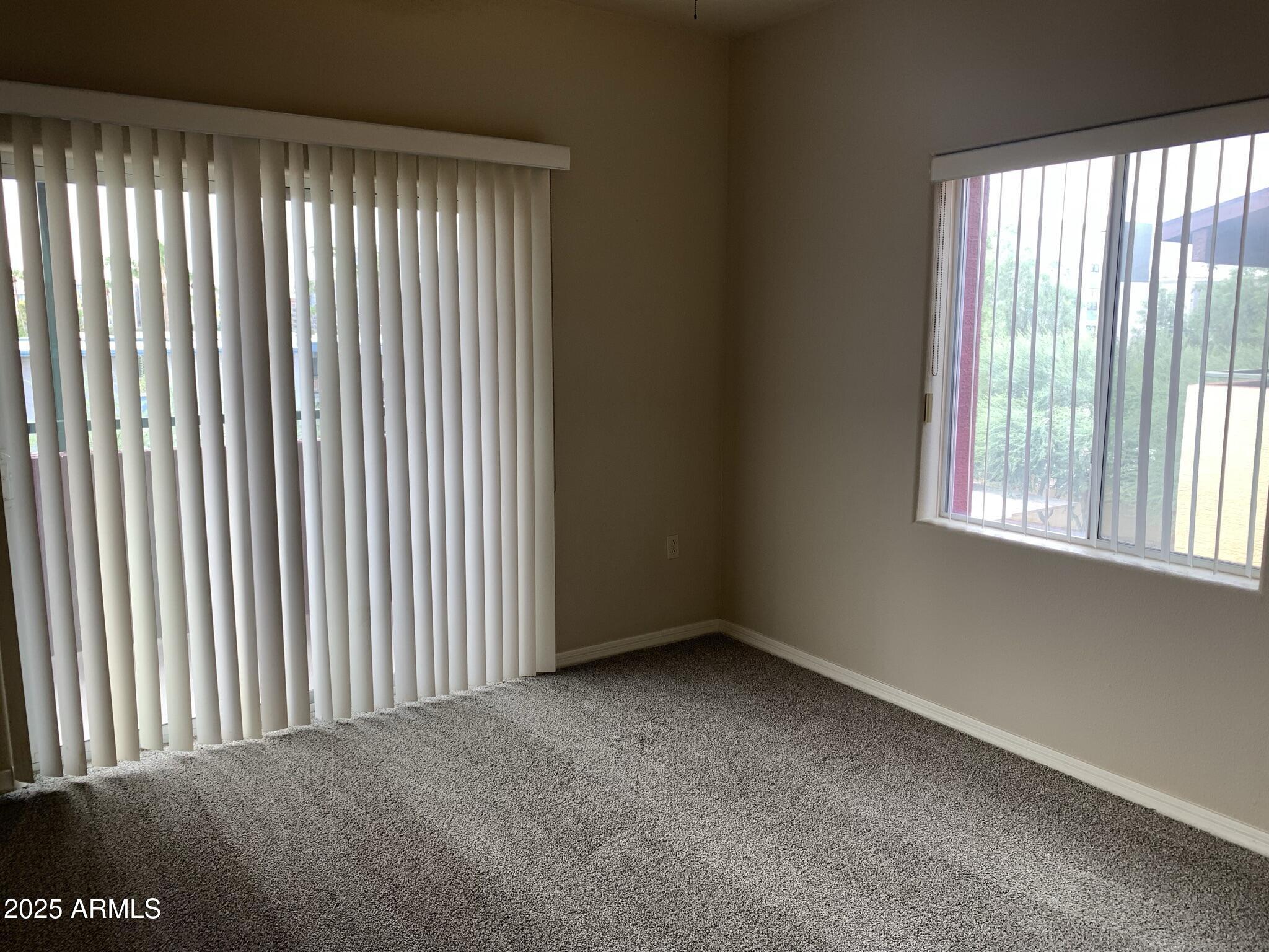 1117 East 8th Street, Unit 3001 Tempe, AZ 85281 - Photo 8 of 16 a view of a room that has a window