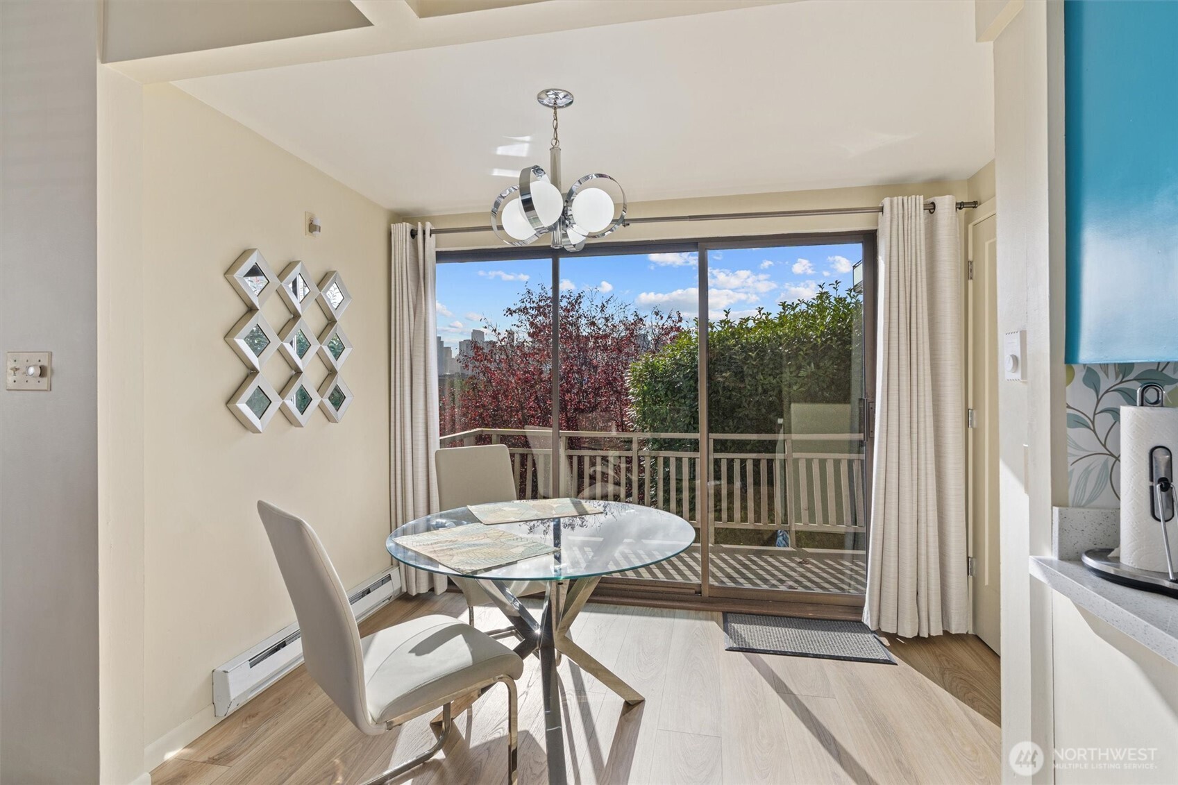 561 Lee Street Seattle, WA 98109 - Photo 11 of 40 a view of a dining room with furniture window and outside view