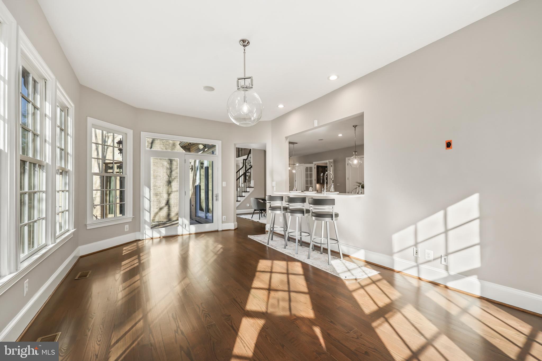 8340 Springhaven Garden Lane McLean, VA 22102 - Photo 16 of 76 a view of an entryway with wooden floor and windows