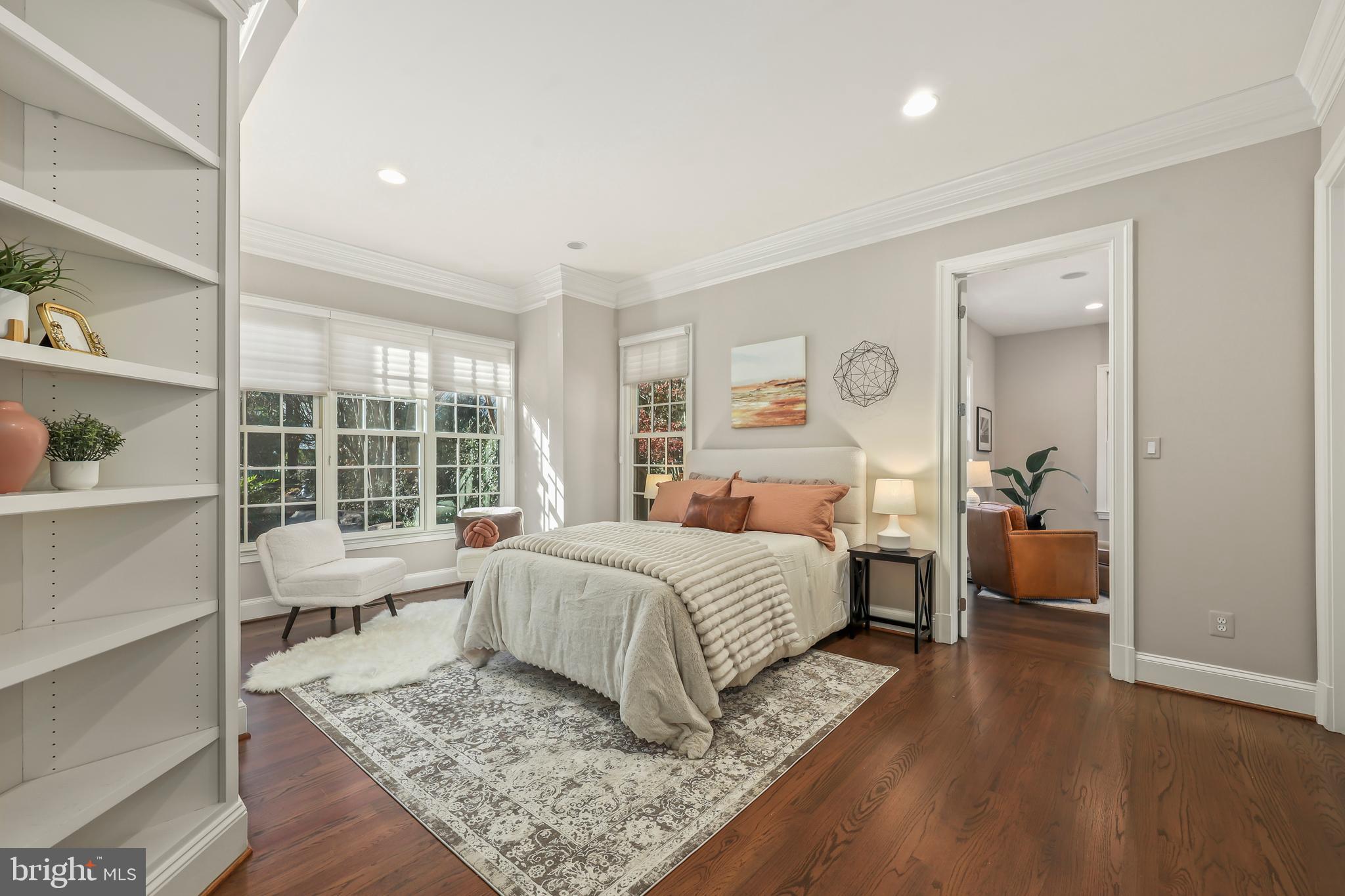 8340 Springhaven Garden Lane McLean, VA 22102 - Photo 23 of 76 a bedroom with a large bed and a window