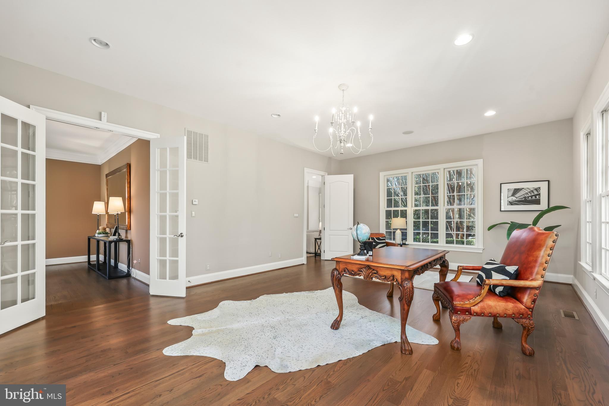 8340 Springhaven Garden Lane McLean, VA 22102 - Photo 26 of 76 a living room with furniture and wooden floor
