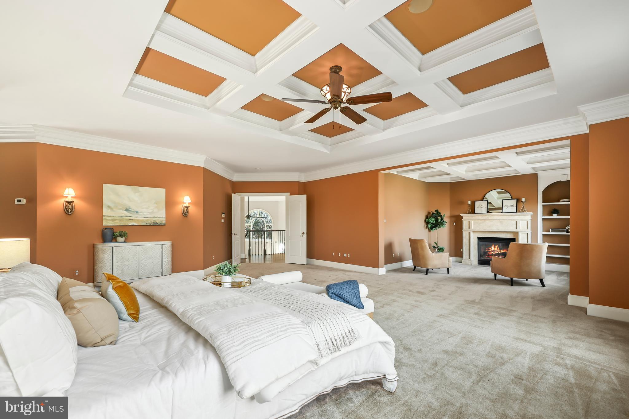 8340 Springhaven Garden Lane McLean, VA 22102 - Photo 34 of 76 a large bedroom with a large bed and a large window