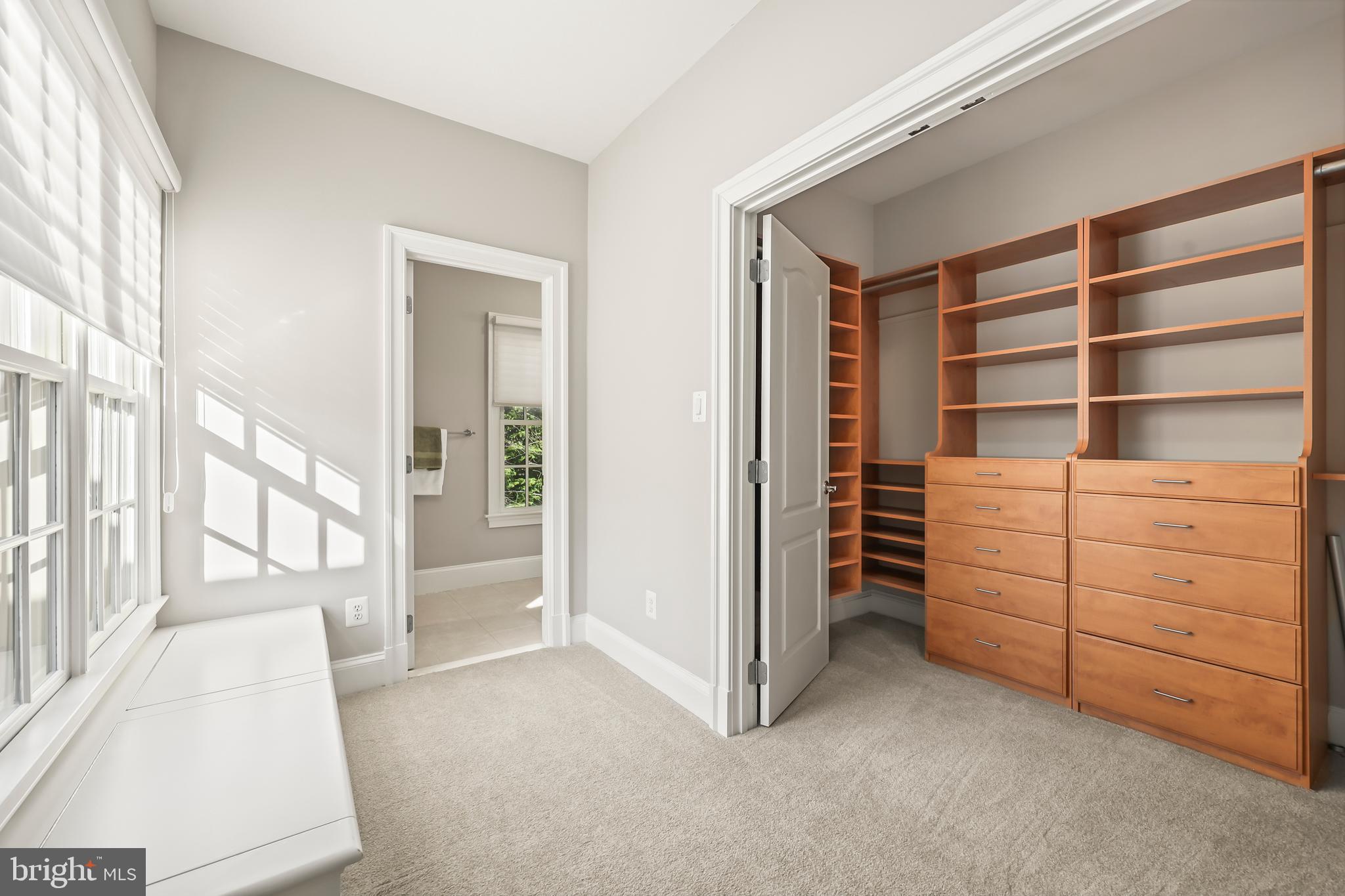 8340 Springhaven Garden Lane McLean, VA 22102 - Photo 47 of 76 a room with furniture and a window