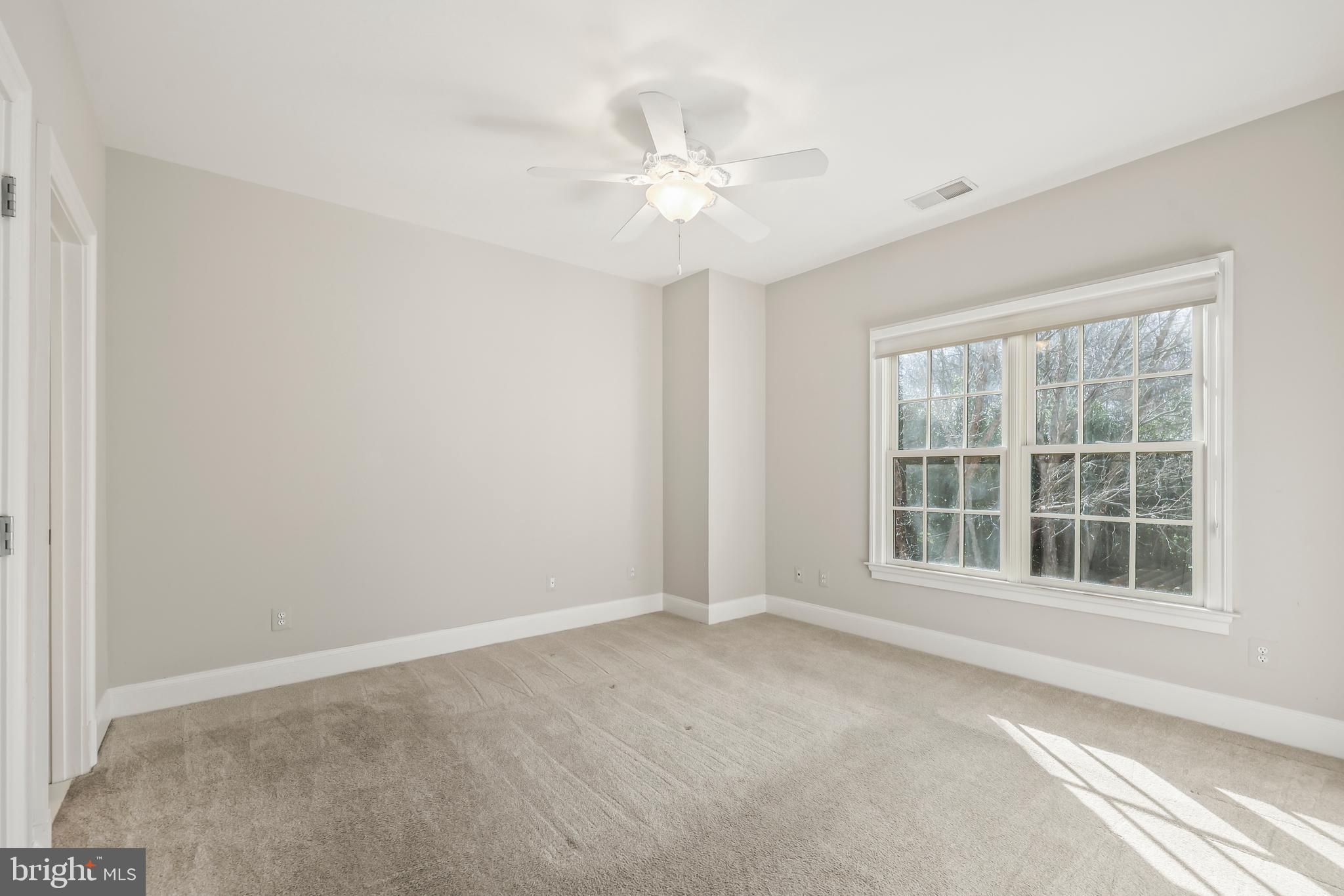 8340 Springhaven Garden Lane McLean, VA 22102 - Photo 50 of 76 a view of an empty room with a window