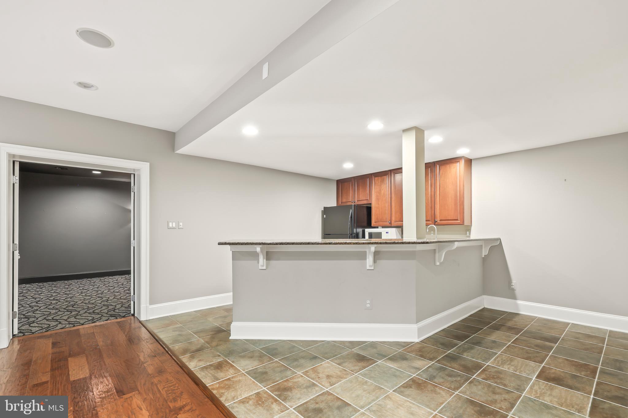 8340 Springhaven Garden Lane McLean, VA 22102 - Photo 53 of 76 a view of kitchen with stainless steel appliances granite countertop a refrigerator a sink and a stove