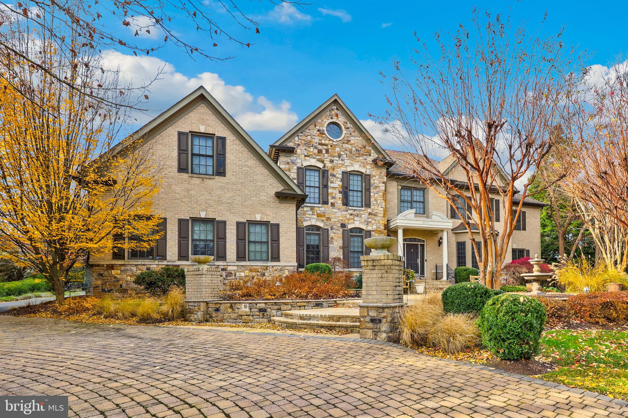 8340 Springhaven Garden Lane McLean, VA 22102 - Photo 68 of 76 a front view of a house with a yard