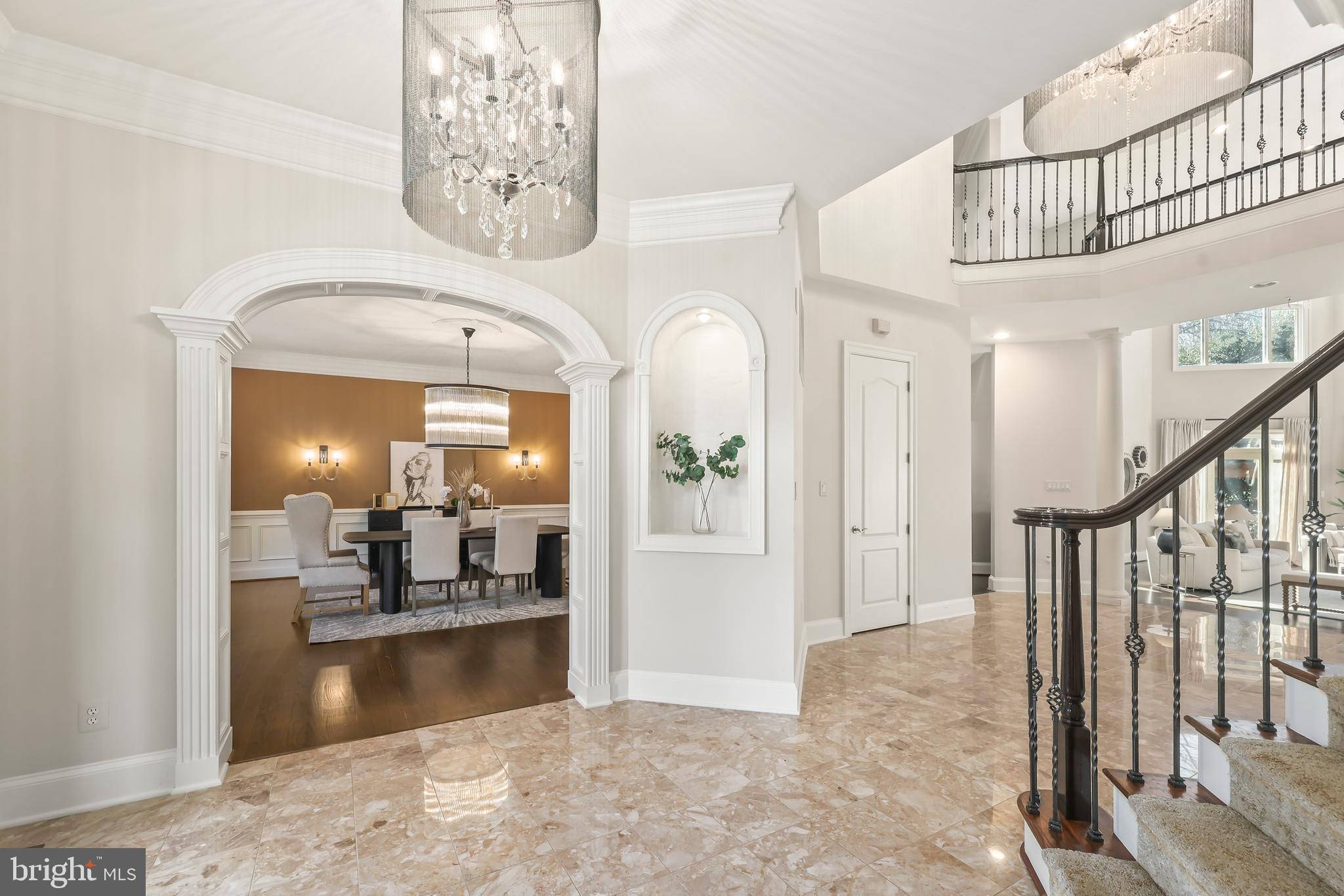 8340 Springhaven Garden Lane McLean, VA 22102 - Photo 7 of 76 a view of a hallway with entryway and dining room