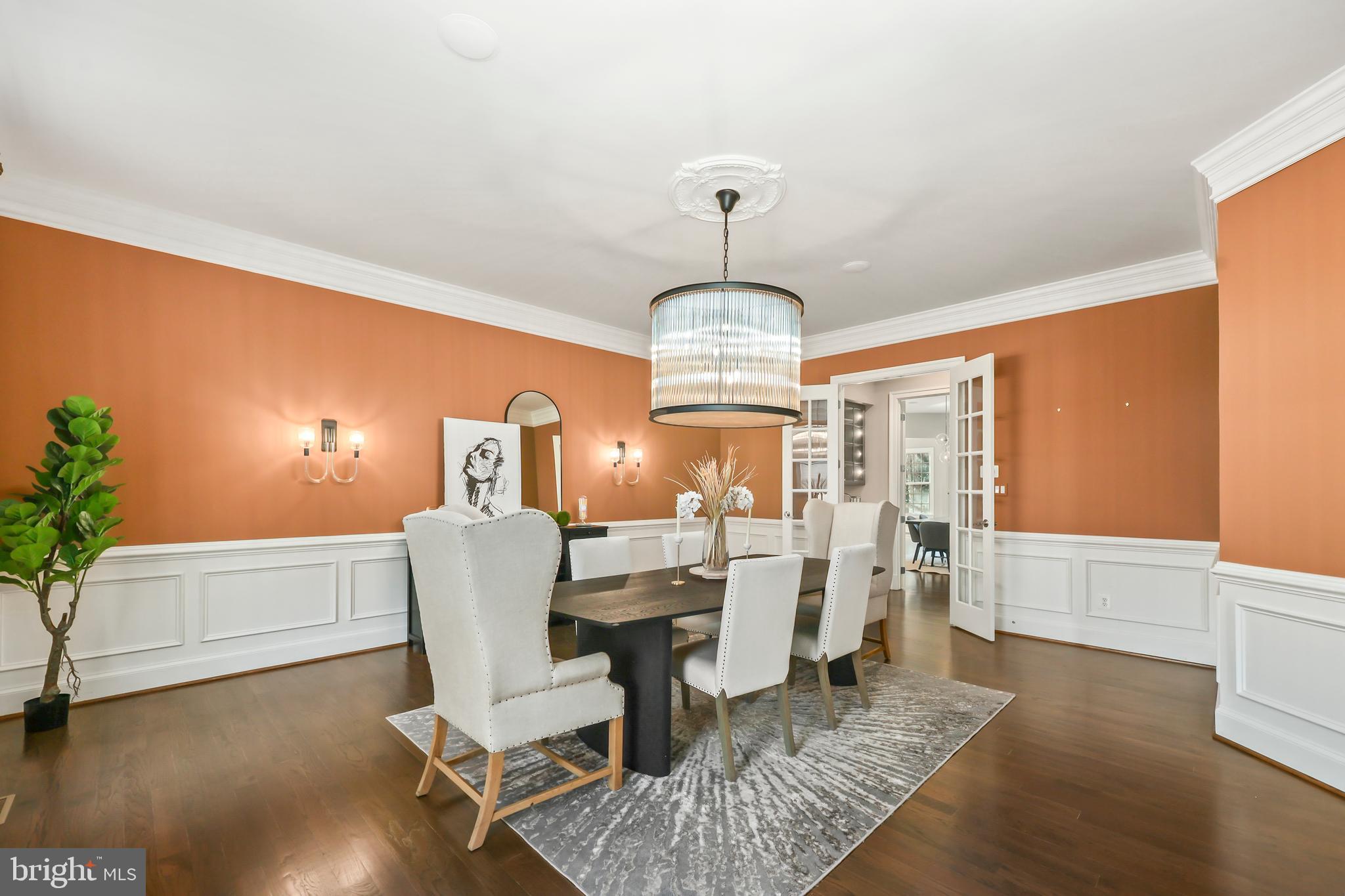 8340 Springhaven Garden Lane McLean, VA 22102 - Photo 8 of 76 a view of a dining room with furniture window and wooden floor