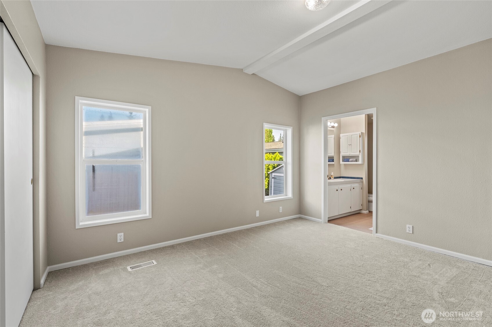 23825 15th Avenue Southeast, Unit 108 Bothell, WA 98021 - Photo 16 of 39 an empty room with windows and closet