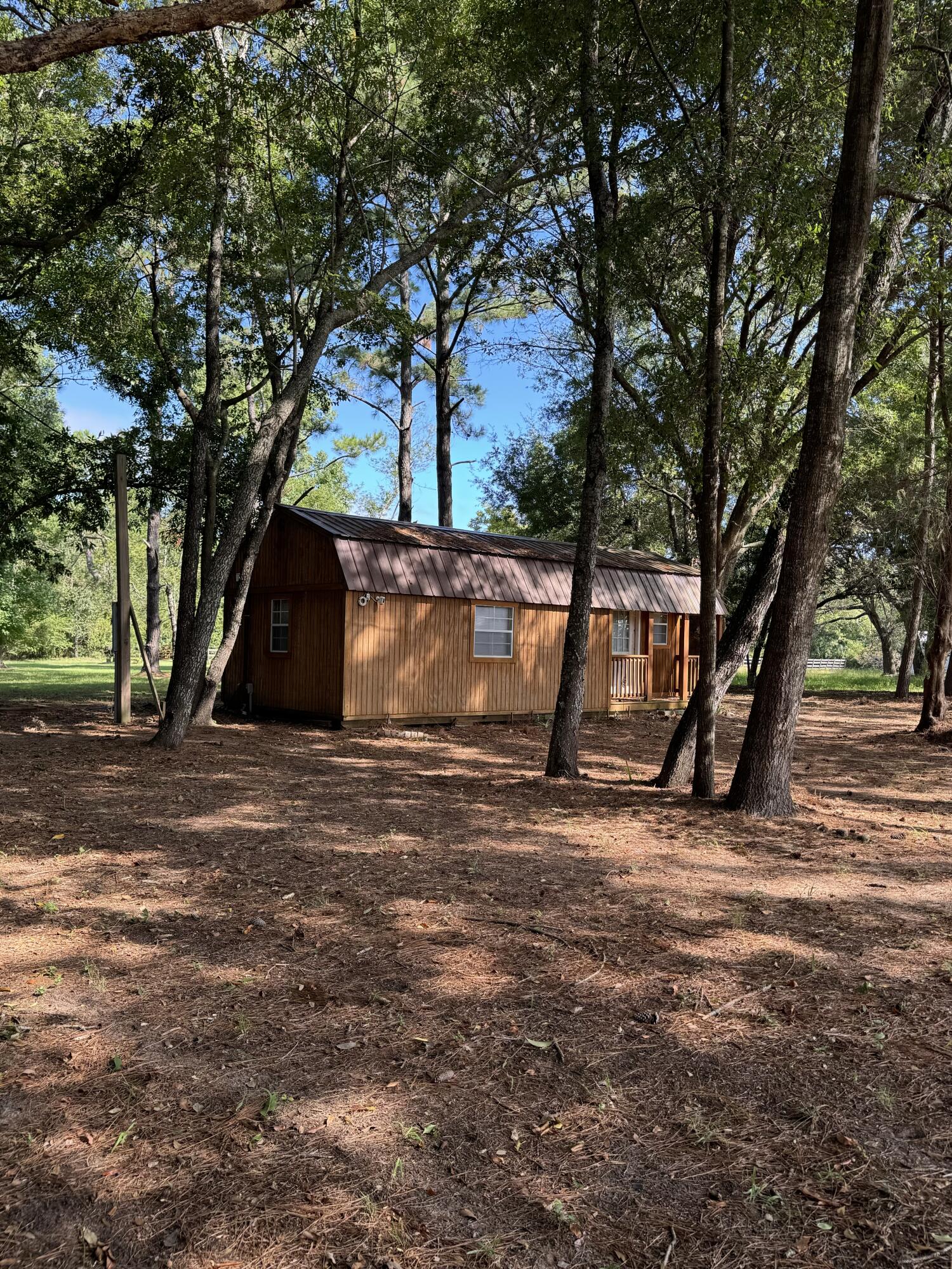 7783 Legare Road Edisto Island, SC 29438 - Photo 17 of 22 Outbuilding from left marsh
