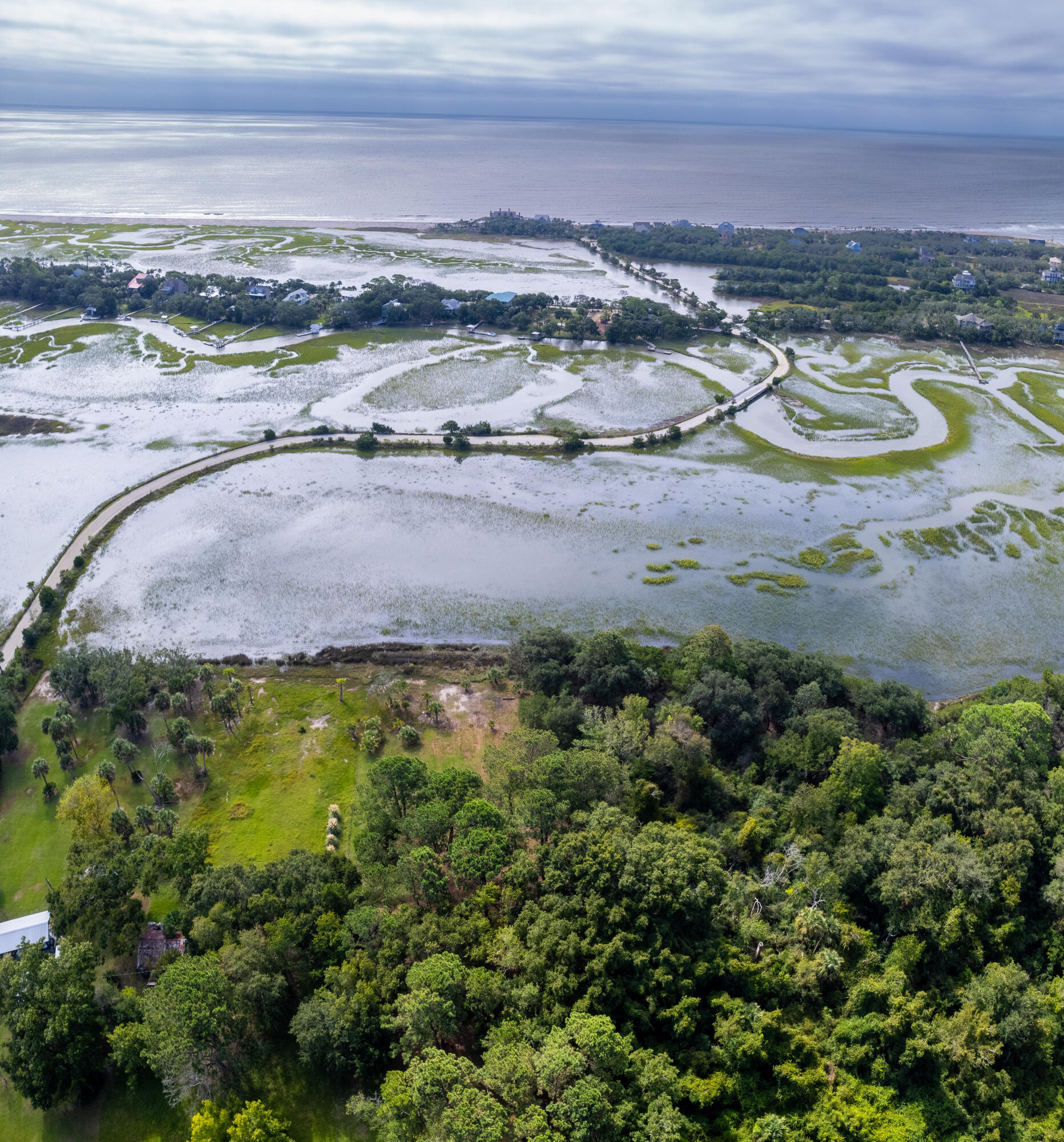 Large aerial view from back of lot faci