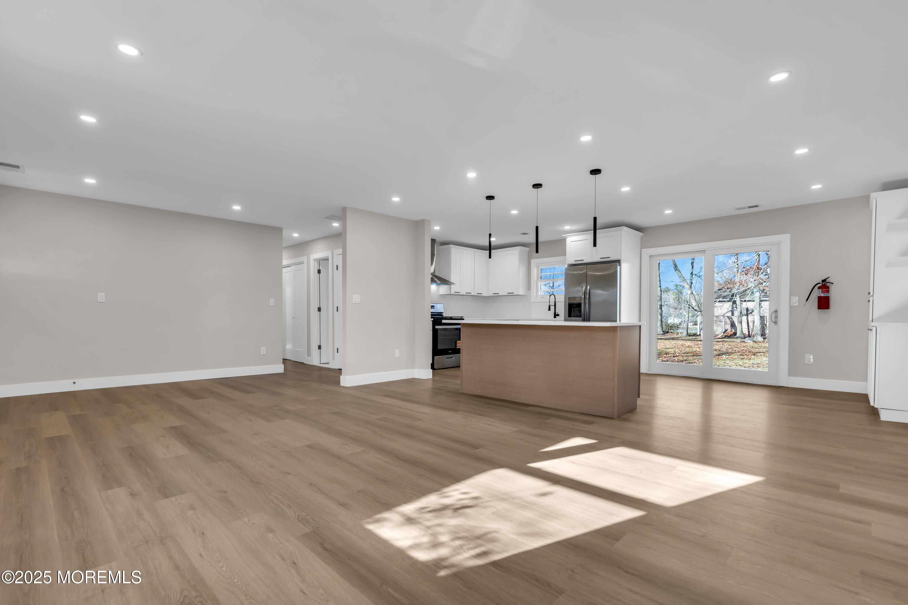 170 Station Road Bayville, NJ 08721 - Photo 10 of 36 a view of kitchen with kitchen island microwave and cabinets