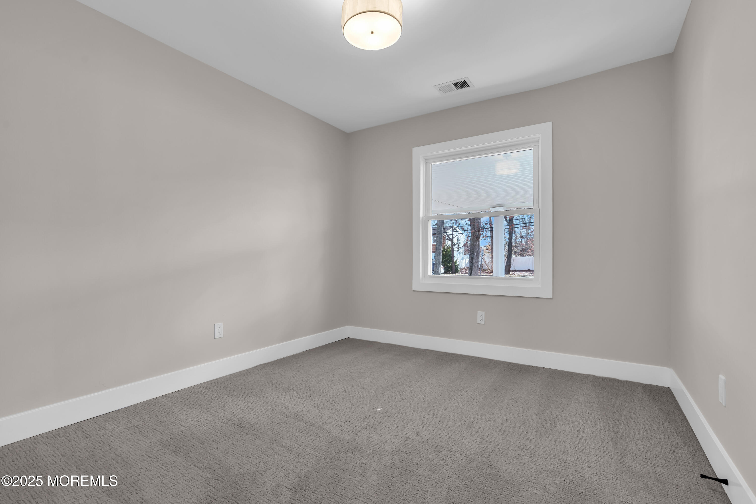 170 Station Road Bayville, NJ 08721 - Photo 13 of 36 an empty room with windows