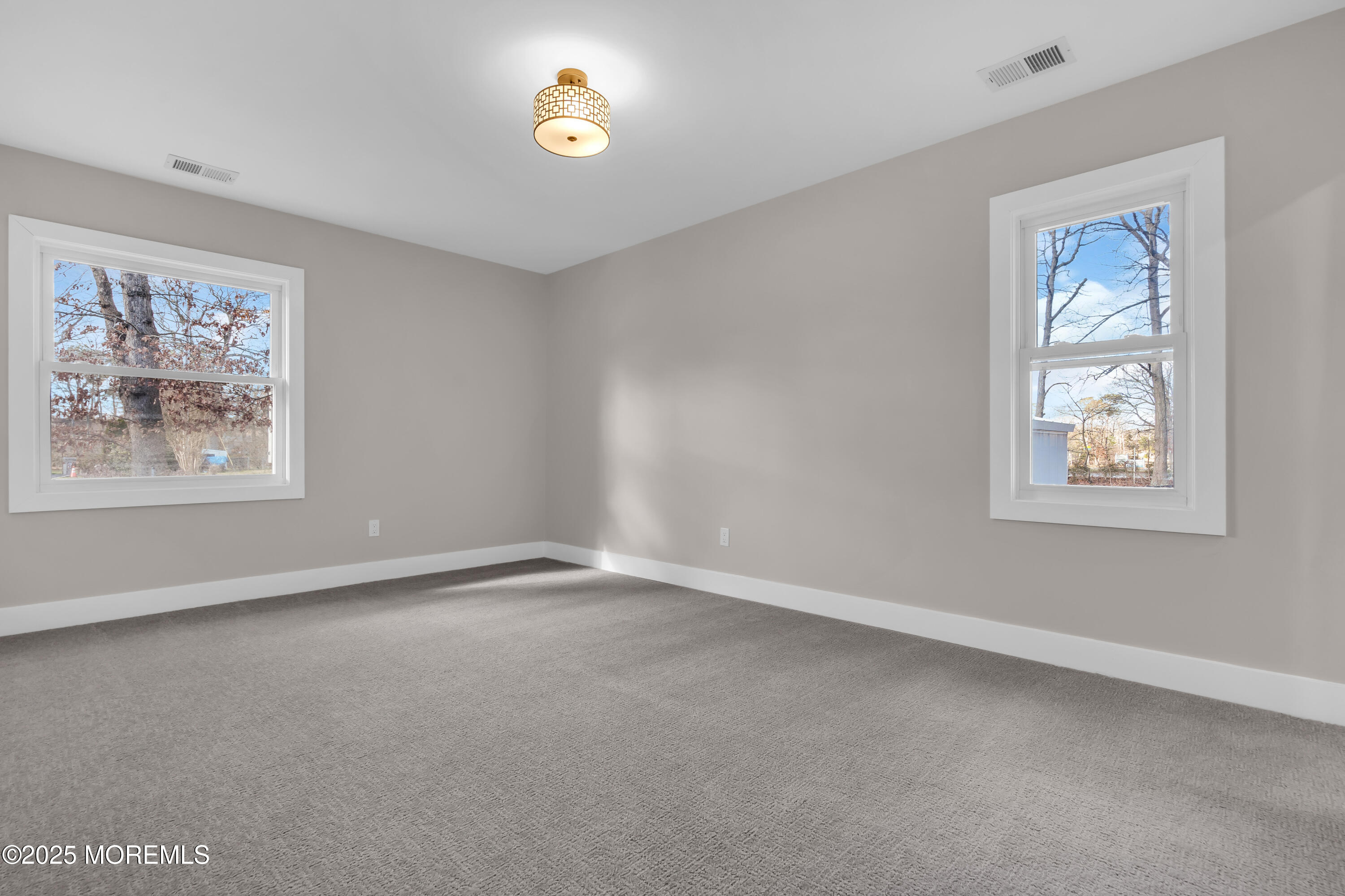 170 Station Road Bayville, NJ 08721 - Photo 18 of 36 a view of an empty room with a window