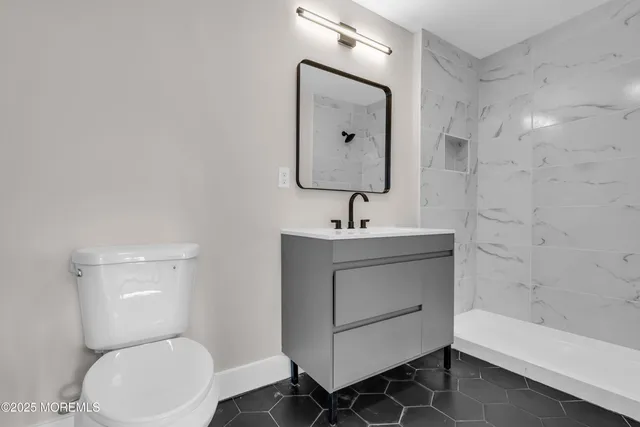 a bathroom with a toilet sink and bathtub