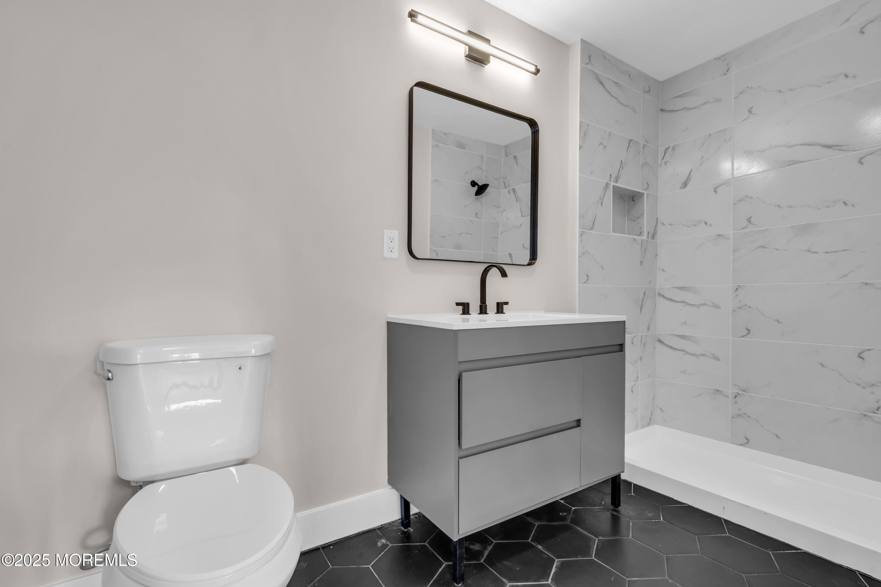 170 Station Road Bayville, NJ 08721 - Photo 30 of 36 a bathroom with a toilet sink and bathtub