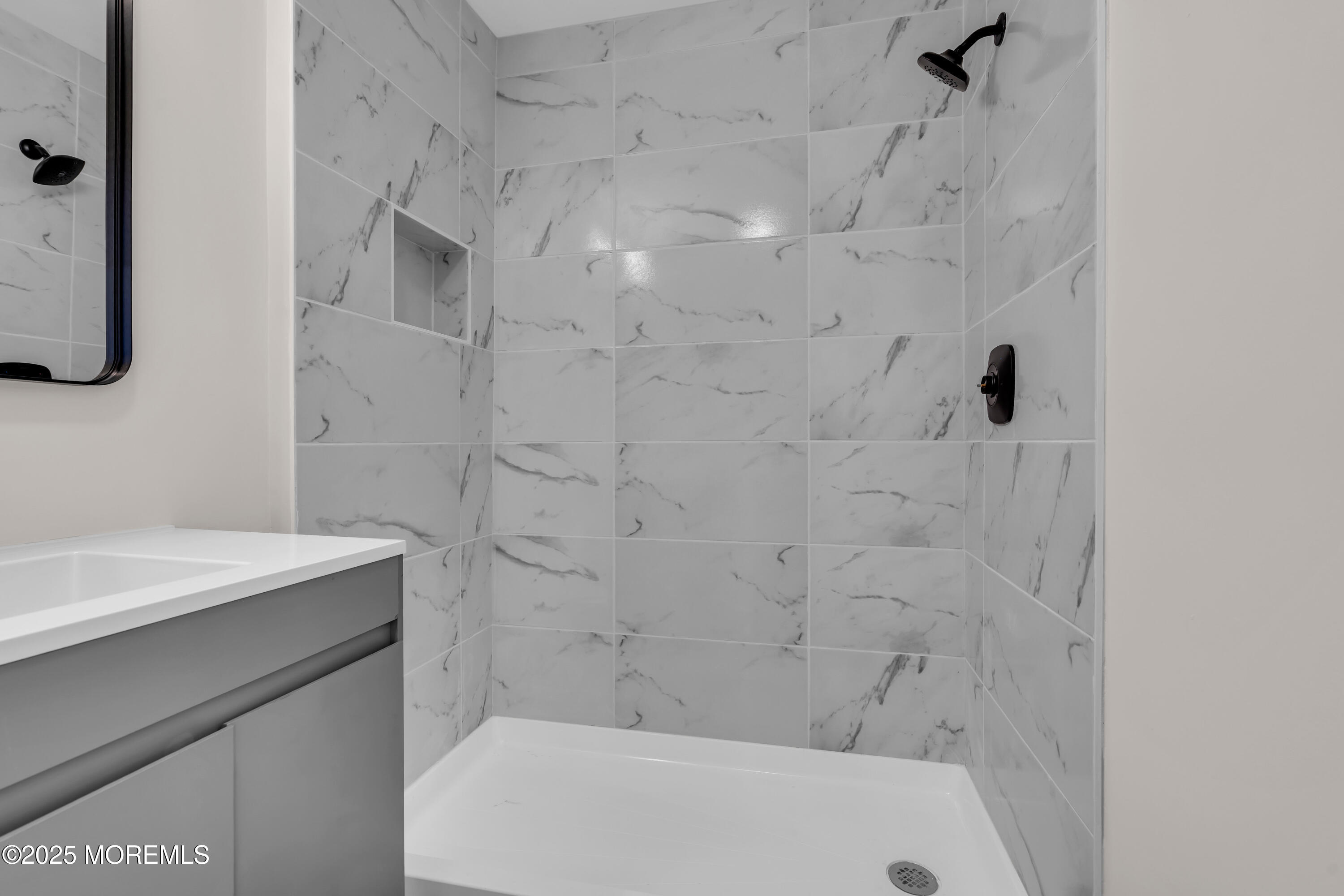 170 Station Road Bayville, NJ 08721 - Photo 31 of 36 a bathroom with a sink a toilet and shower