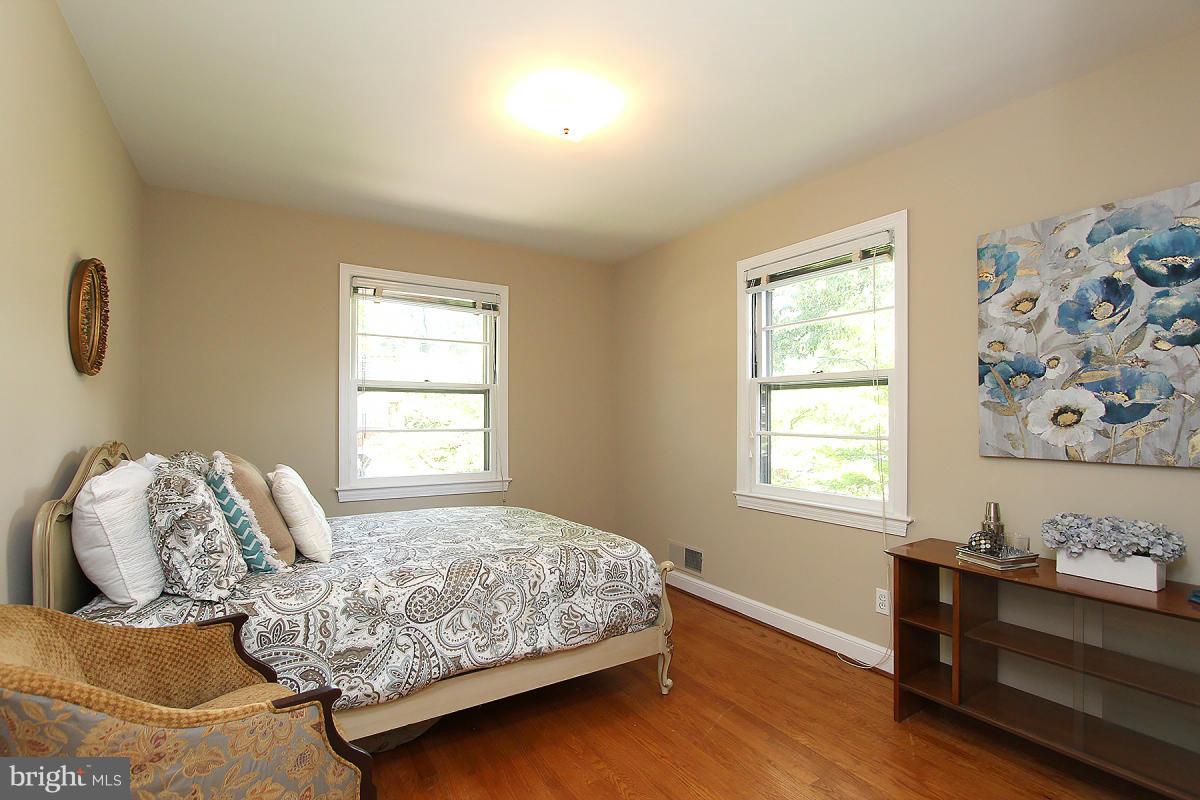10109 Portland Place Silver Spring, MD 20901 - Photo 19 of 26 a bedroom with a bed and a window