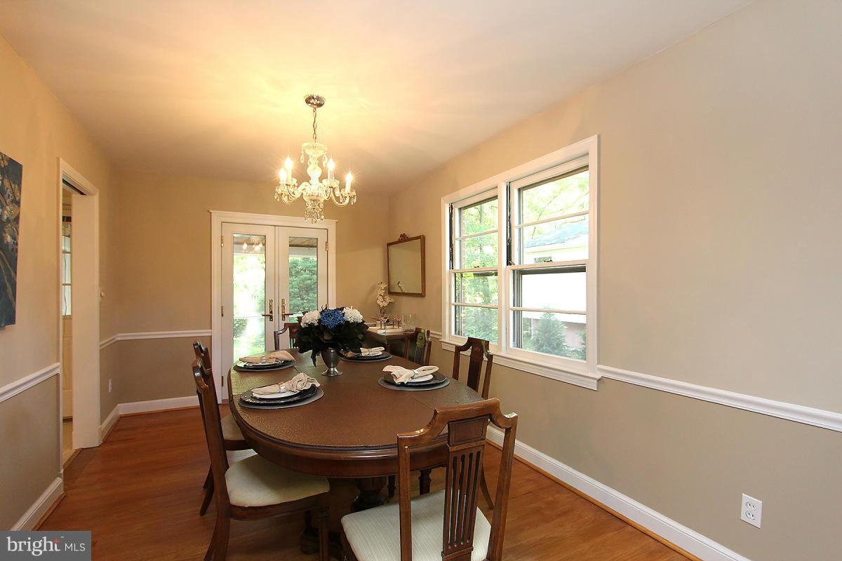10109 Portland Place Silver Spring, MD 20901 - Photo 6 of 26 a view of a dining room with furniture and window