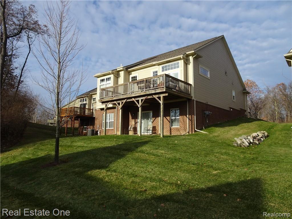 609 Mountain Circle, Unit 14 Rochester, MI 48306 - Photo 2 of 27 Private back yard off walk out