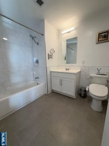 wooden floor with a potted plant on a table