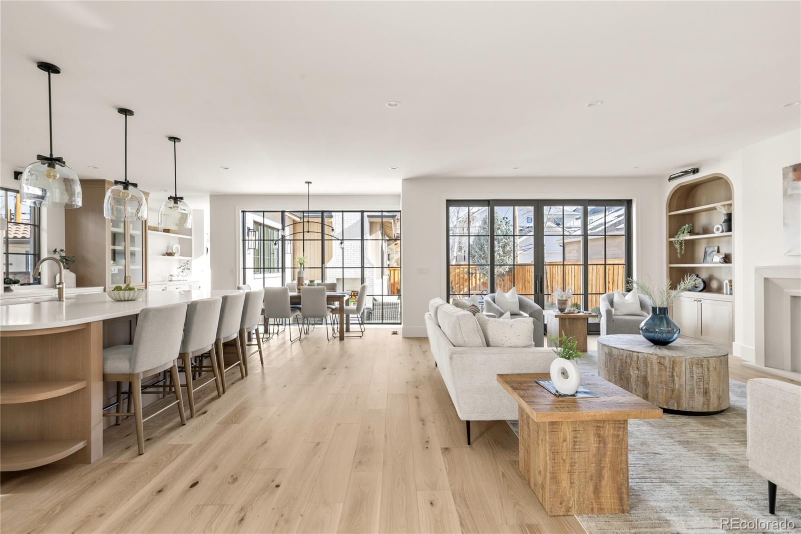 2658 South Adams Street Denver, CO 80210 - Photo 11 of 34 a living room with furniture and a wooden floor