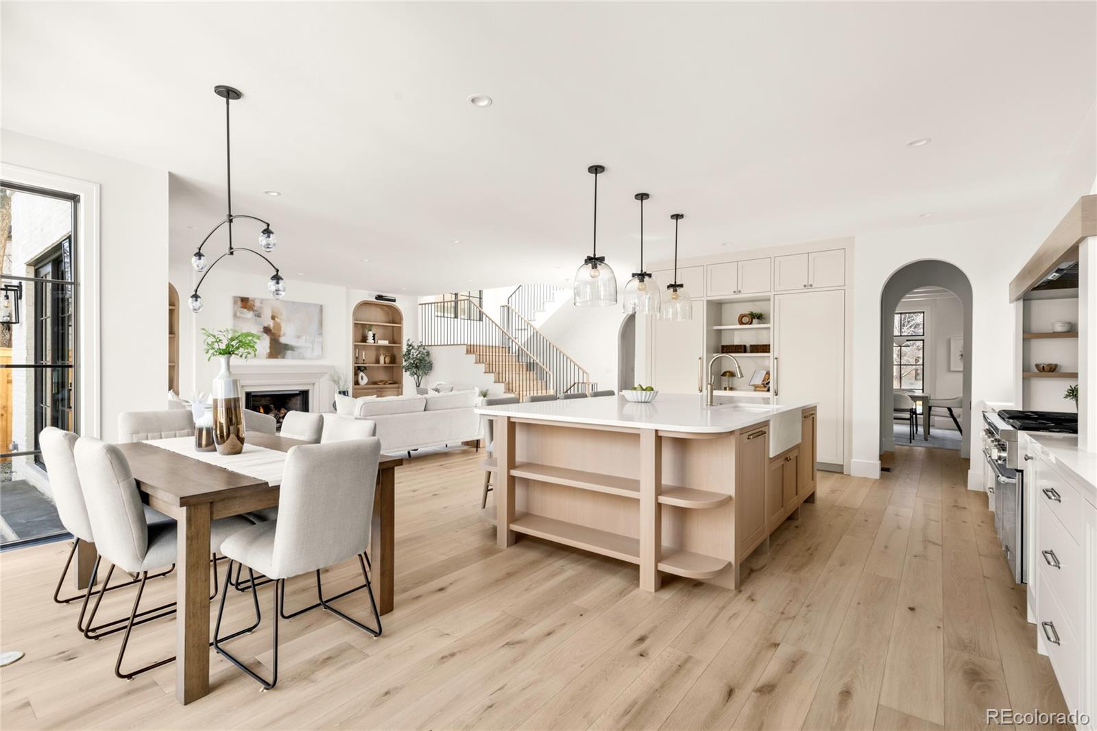 2658 South Adams Street Denver, CO 80210 - Photo 12 of 34 a dining room with furniture and wooden floor