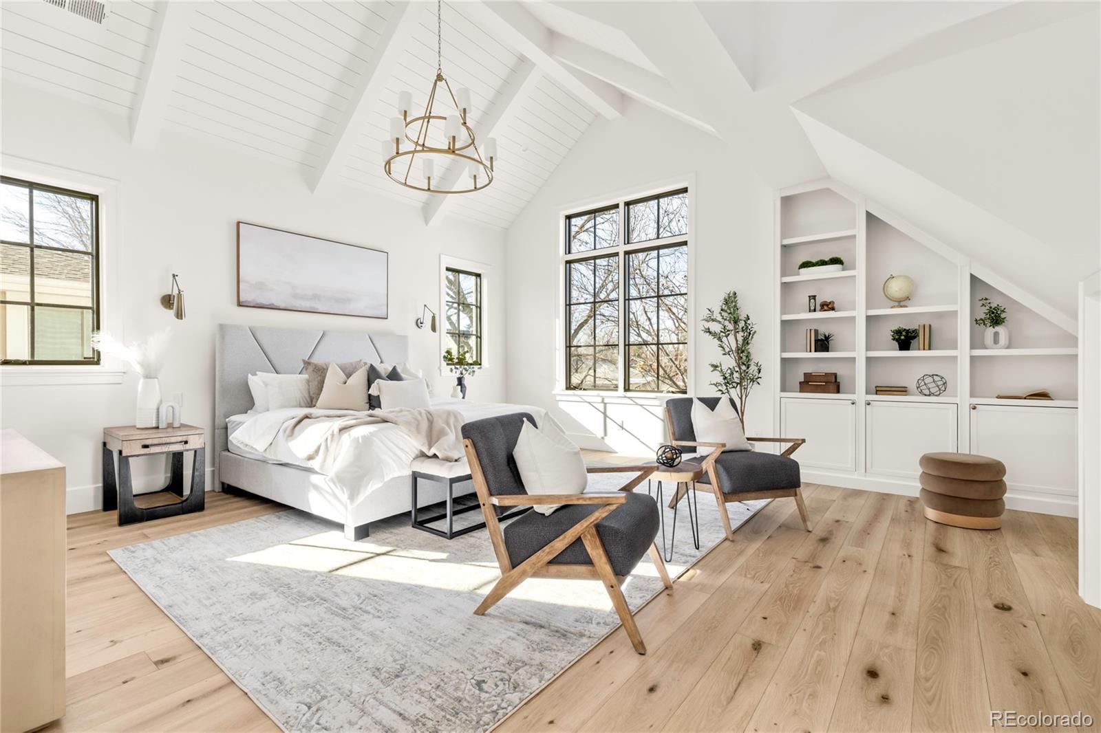 2658 South Adams Street Denver, CO 80210 - Photo 21 of 34 a living room with furniture and a table
