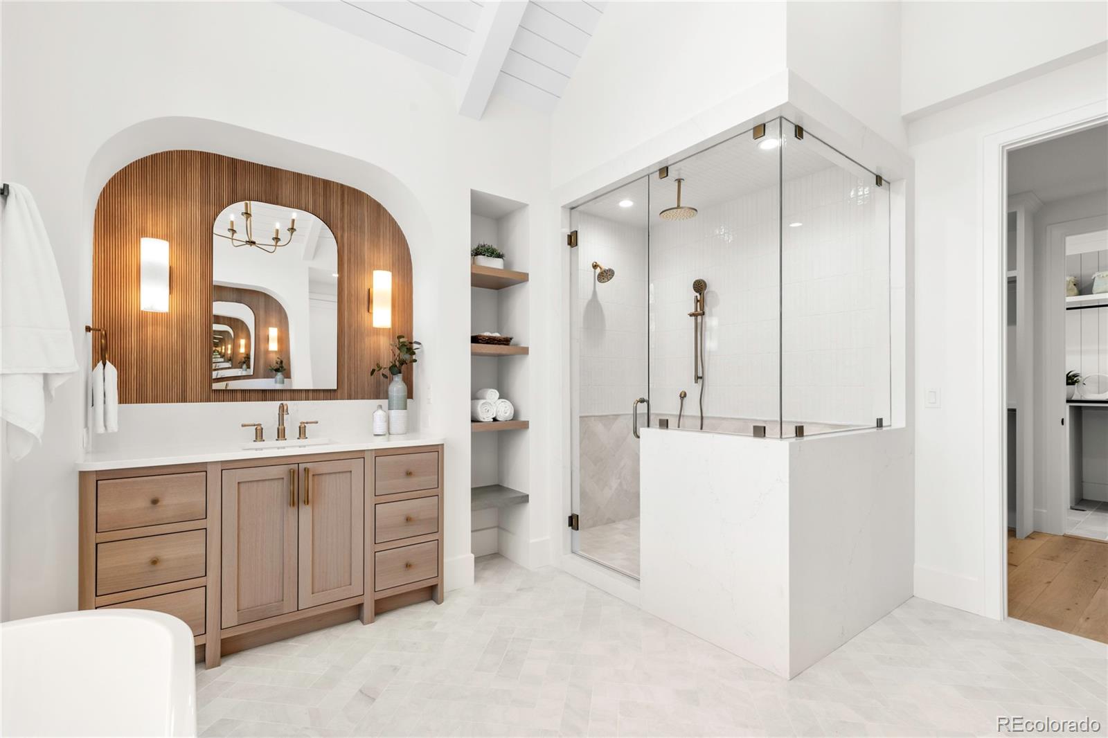 2658 South Adams Street Denver, CO 80210 - Photo 24 of 34 a large bathroom with a double vanity sink and a mirror