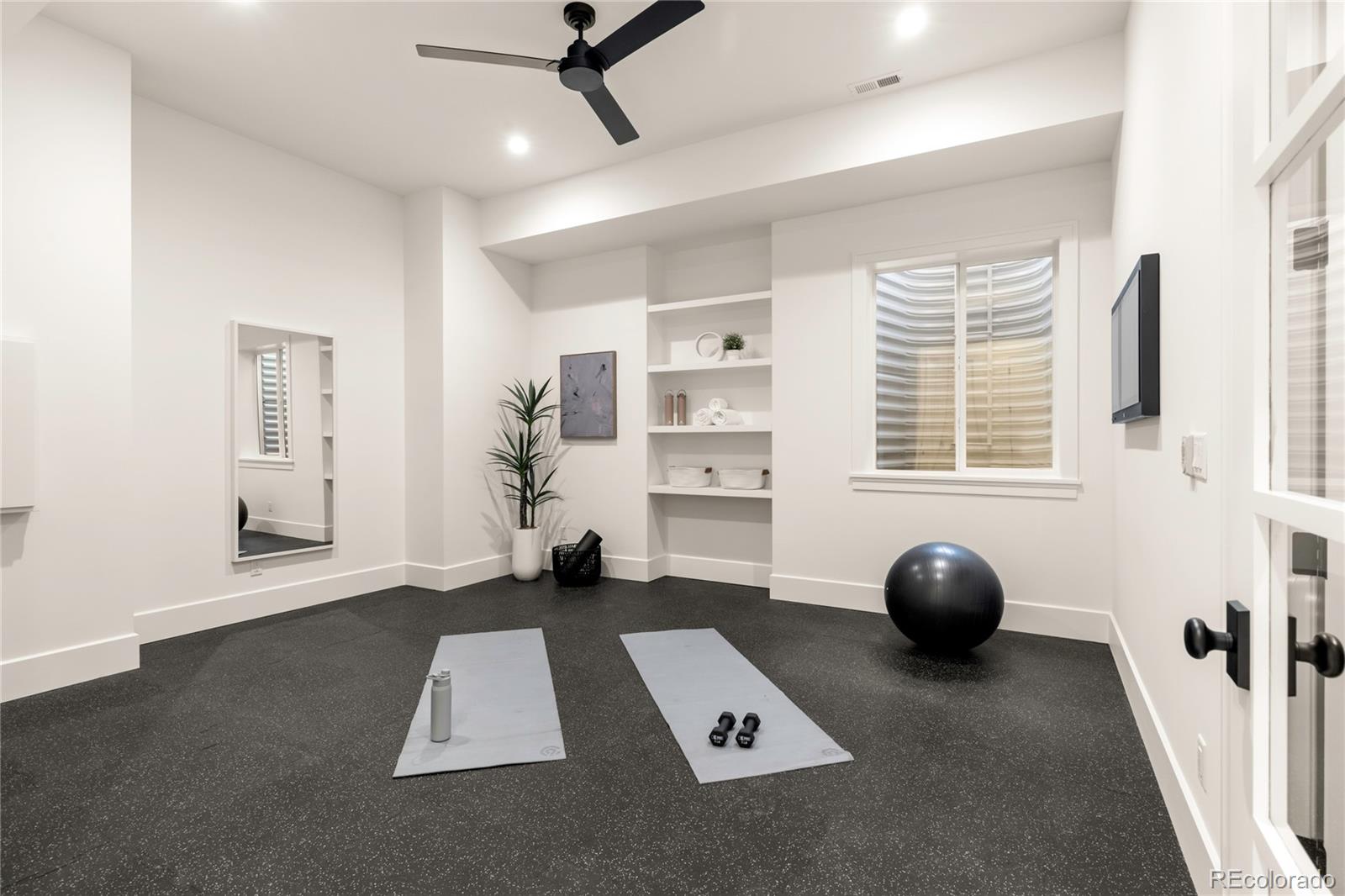 2658 South Adams Street Denver, CO 80210 - Photo 30 of 34 a view of livingroom with furniture and windows
