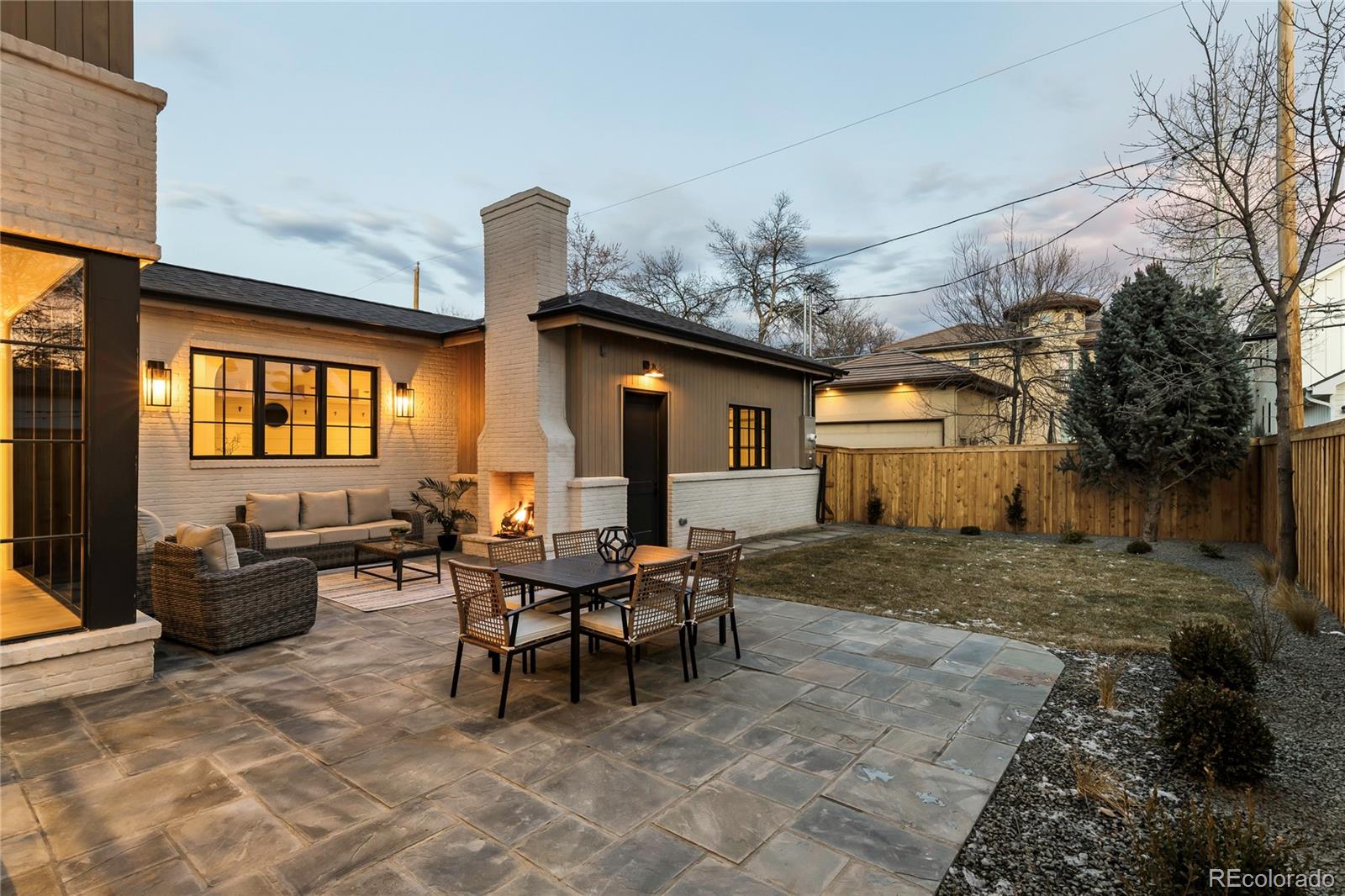 2658 South Adams Street Denver, CO 80210 - Photo 4 of 34 a view of a house with backyard and sitting area