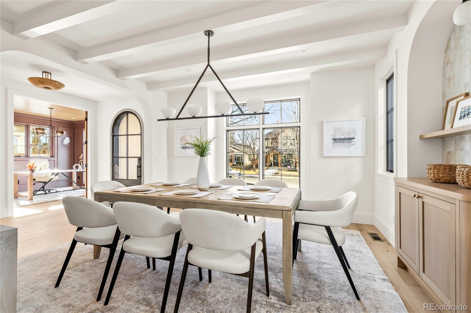 2658 South Adams Street Denver, CO 80210 - Photo 7 of 34 a view of a dining room with furniture window and wooden floor