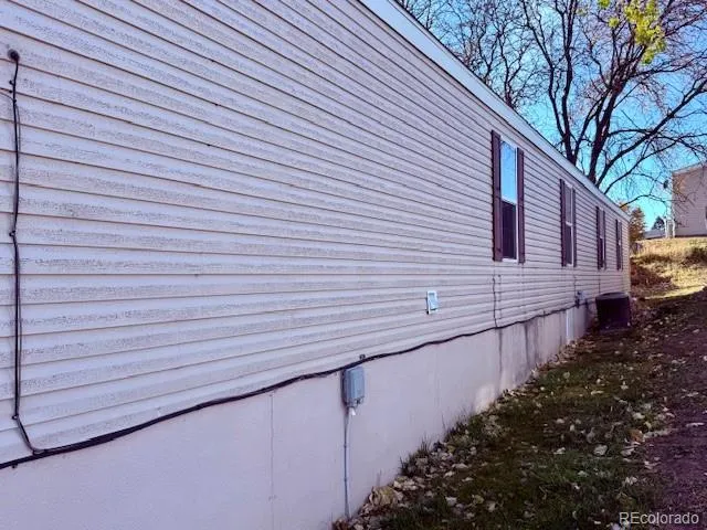 a view of a back yard of the house