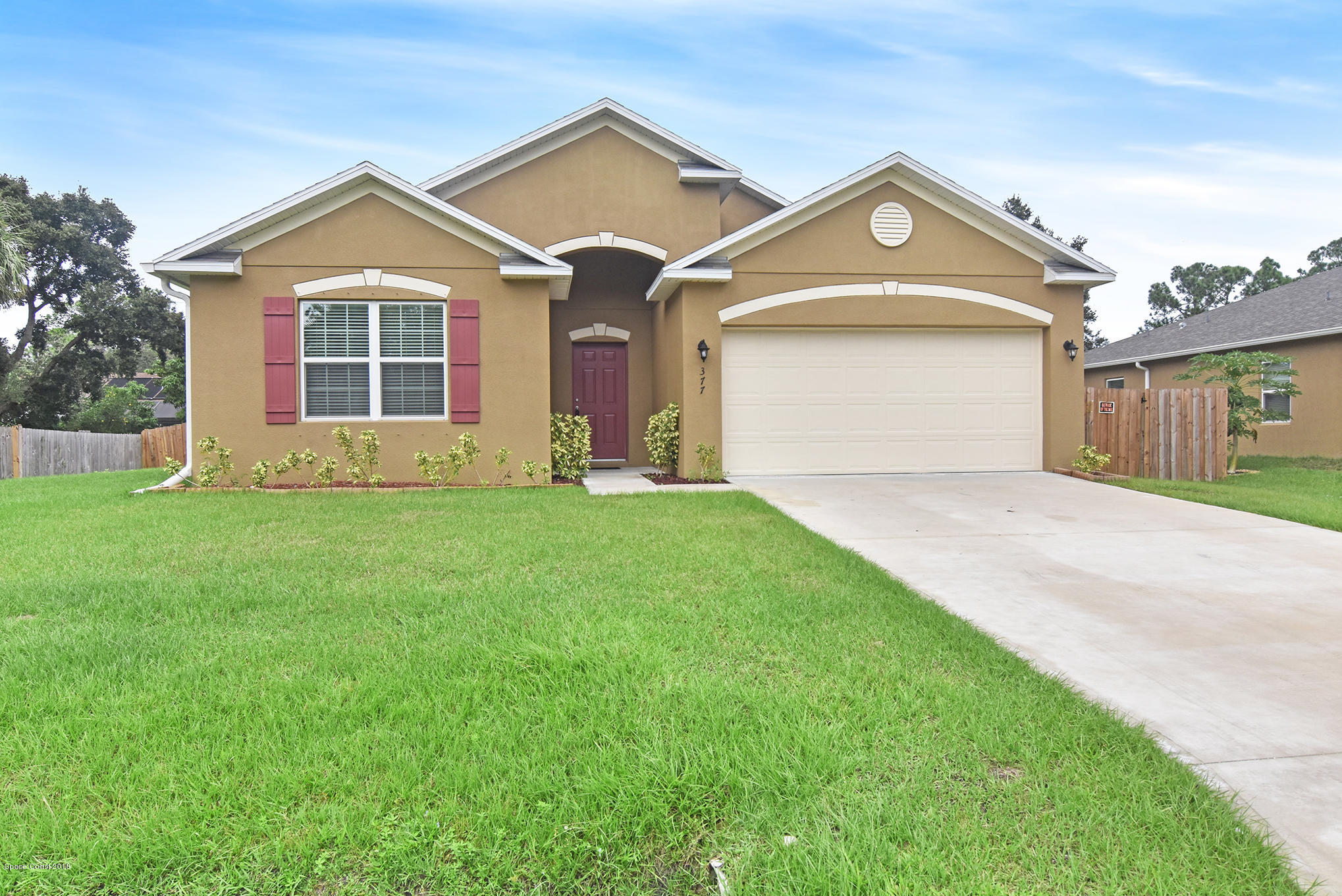 377 Rheine Road Northwest Palm Bay, FL 32907 - Photo 1 of 21 Front