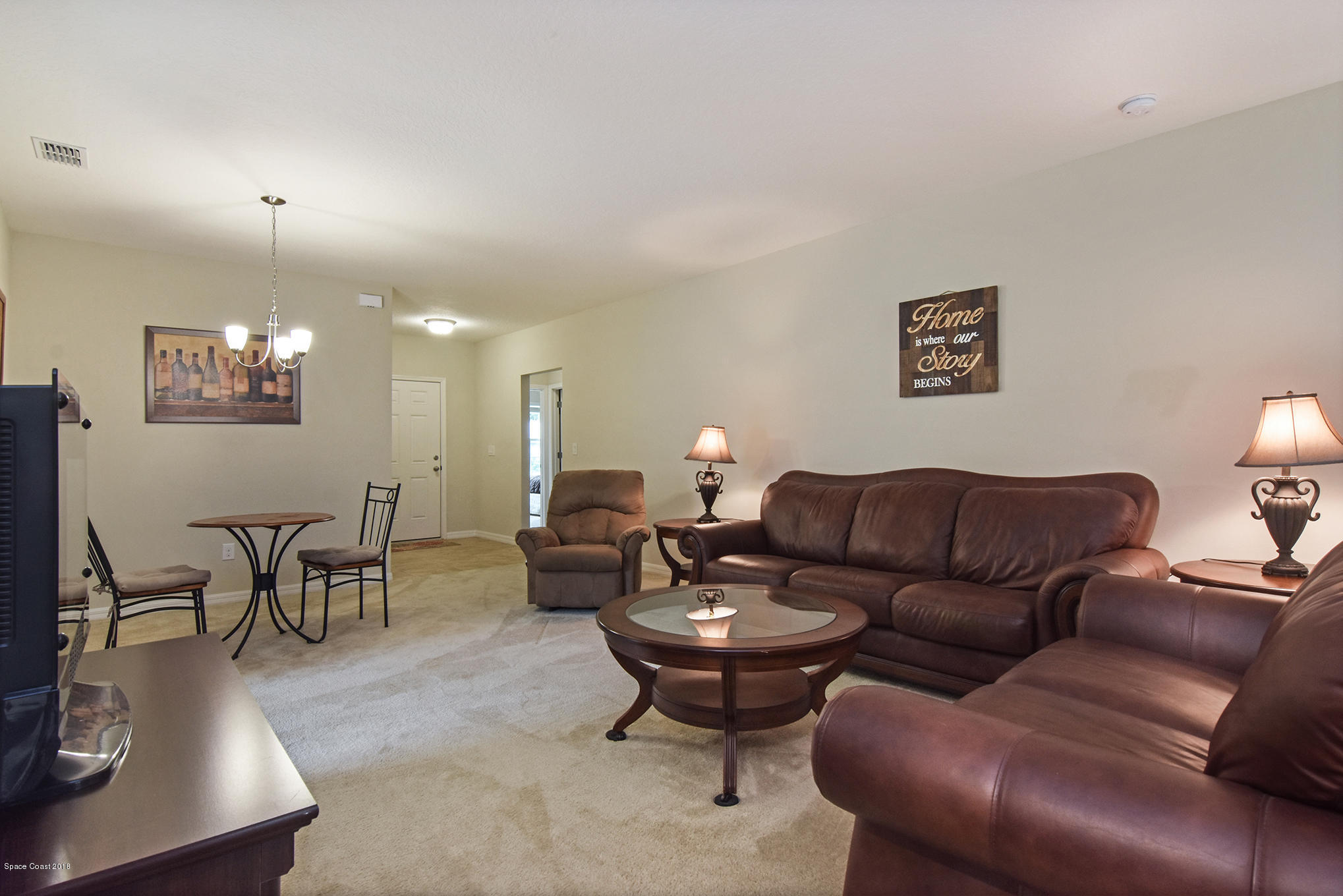 377 Rheine Road Northwest Palm Bay, FL 32907 - Photo 2 of 21 Entry/Living/Dining