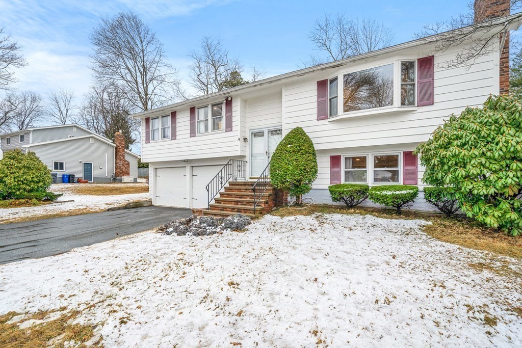28 Sycamore Road Methuen, MA 01844 - Photo 1 of 35 a view of a house with a snow on the road