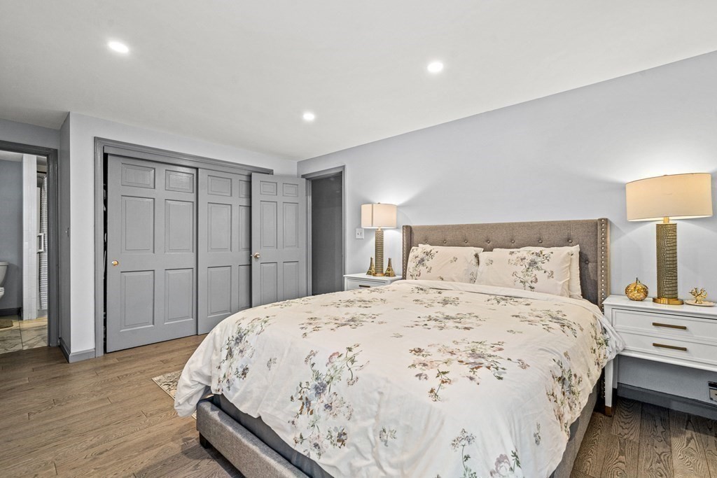 28 Sycamore Road Methuen, MA 01844 - Photo 20 of 35 a bedroom with a bed and a lamp