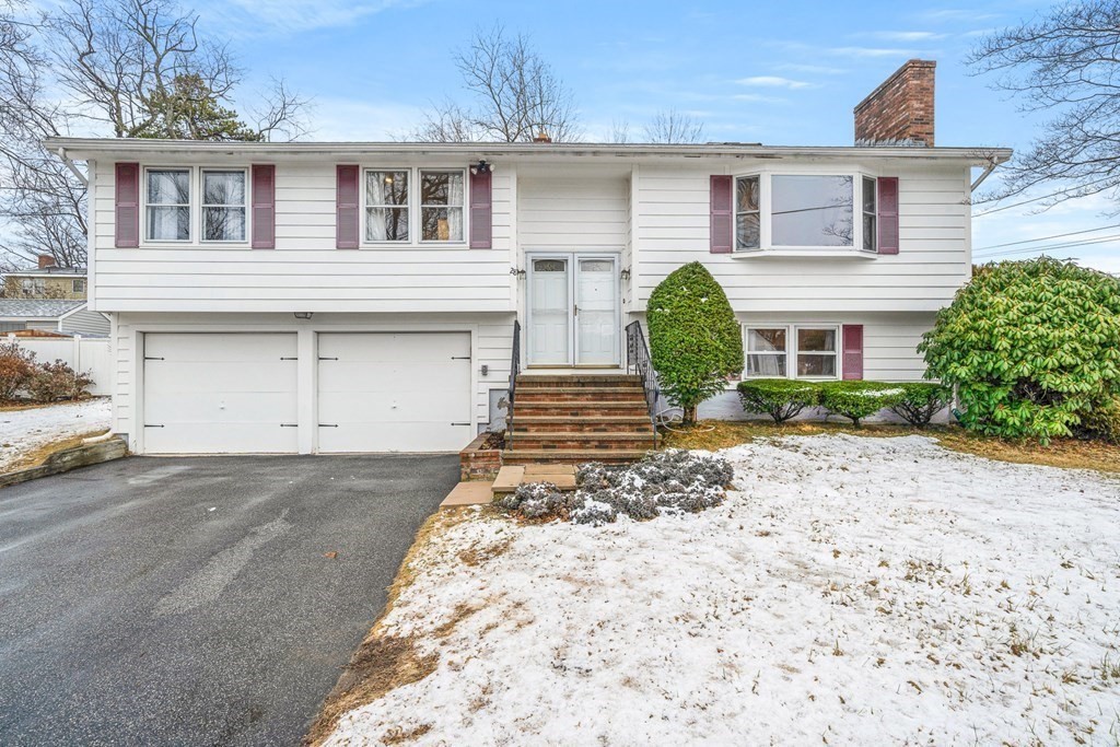 28 Sycamore Road Methuen, MA 01844 - Photo 2 of 35 a front view of a house with garden