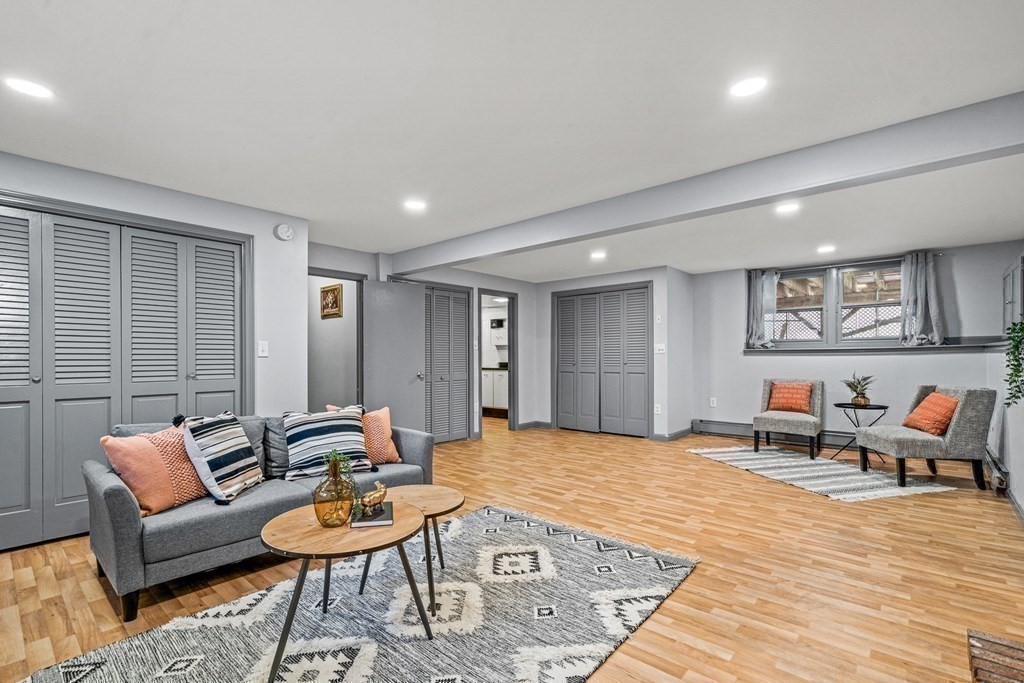 28 Sycamore Road Methuen, MA 01844 - Photo 24 of 35 a living room with furniture and wooden floor